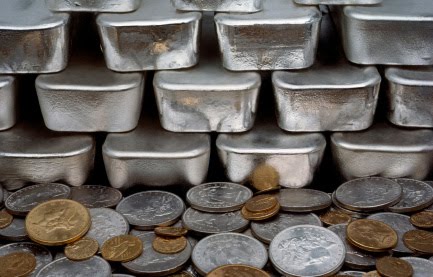 Monedas y lingotes de plata y oro