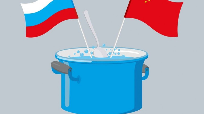 Banderas de China y Rusia en una olla