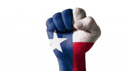 Bandera de Texas en puño